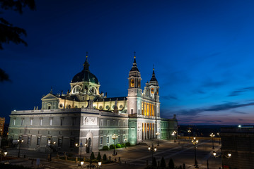 Naklejka na ściany i meble View of the Almudena cathedral at dusk in the city of Madrid, Spain.