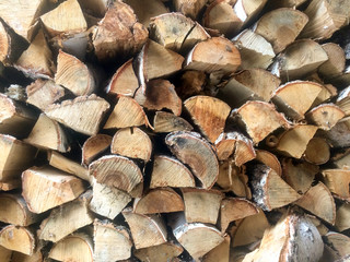 Fototapeta premium Pile of chopped fire wood prepared for winter