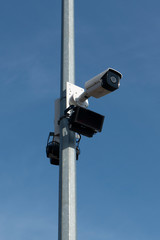 CCTV camera mounted on a pole.