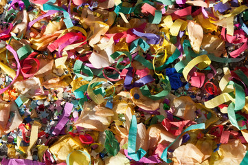 Confetti and colored paper after a wedding