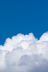 Fototapeta na wymiar Clouds of cumulus clouds on a blue sky