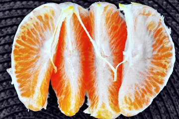 Peeled slices of citrus fruit