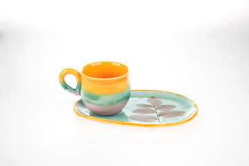 colorful handmade ceramic cups isolated