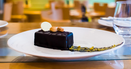 Selection of desserts: amandine, meringue with chocolate and strawberries, caramel cake