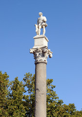 Fototapeta na wymiar Statue Julius Caesar in the Alameda de Hercules important public space in downtown of Seville with a modern atmosphere, Spain