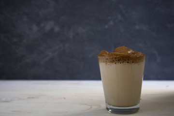 Dalgona coffee - instant coffee or espresso, whipped with sugar and hot water, Trendy Korean recipe for whipped coffee