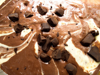 milky cream and chocolate cake mix with bitter drops