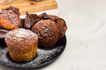 Different homemade muffins with chocolate and cacao and baking. Copyspace.