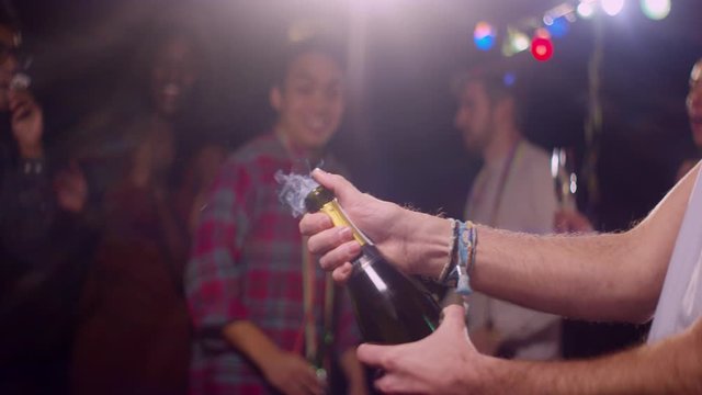 CU Man Pops Champagne Bottle at Party