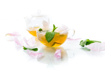summer flower tea from rose petals in a glass cup