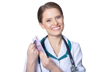 Female doctor holding money isolated on white background