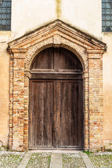 Obraz na płótnie Canvas View on the entrance of the church of San Martino in the village of Este in the province of Padua, Veneto - Italy