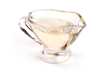 Vegetable oil in a Gravy boat, isolated on white background