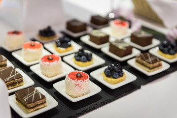 Set of beautiful (delicious) cakes in the restaurant