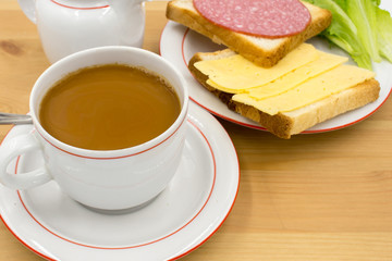 Breakfast: toast, sausage, cheese, egg, morning, salami.