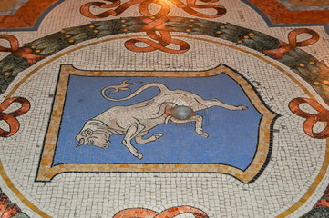 Bull Mosaic on floor of Vittorio Emanuele gallery, Milan, Italy