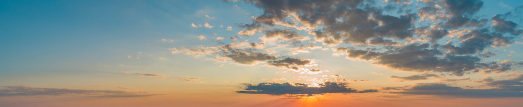 Large panorama with sunset sky with multicolor clouds © LALSSTOCK