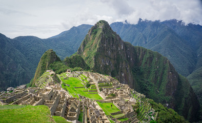 Ruins of the ancient Inca city surrounded by mountains