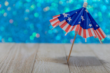 Open for business USA concept with closed umbrella with red, white, blue flag blank sign copy space.  Good for Memorial Day, patriotic, July 4, picnic, party.