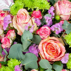 Bouquet of red roses and chrysanthemums.
