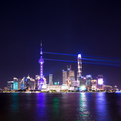 Obraz premium Lightshow Shanghai Skyline at night during international import and export expo