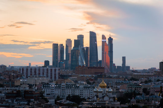 Incredible evening panoramic view of the center of Moscow . Moscow city towers Incredible sunset over Moscow. © Denis Tikhomirov