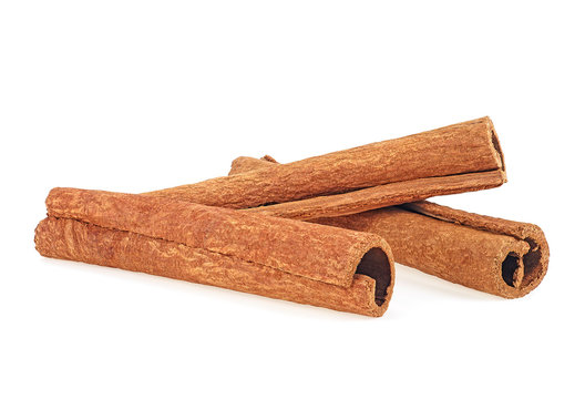 Front view of cinnamon sticks isolated on white background. Aromatic cinnamon sticks.