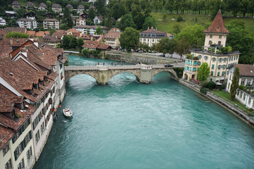 Fototapeta na wymiar View of Bern, houses, river and bridge, Switzerland 