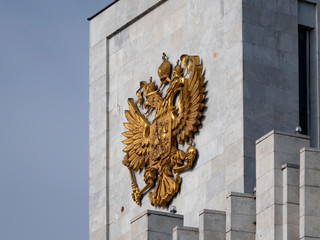Moscow The Coat Of Arms Of The Russian Federation On The Top Of The Government House