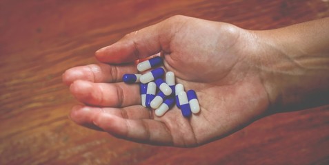 pills in hand