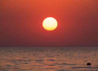 Fototapeta na wymiar Sunset at sea