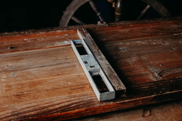 wooden table on the background of a woodworking workshop.