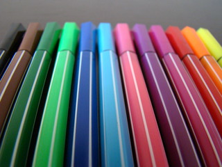Colorful pens and pencils on the table