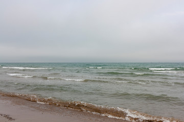 Wave of the sea on the sand beach