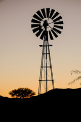 windmill silhouette on sunset