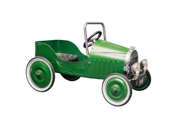 Poster Retro metalen groene auto speelgoed geïsoleerd op een witte achtergrond. Groene retro vintage speelgoedauto © spyrakot