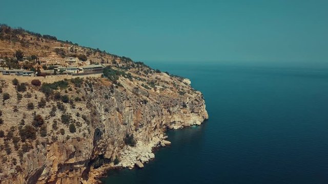 Greece thasos areal view of cliff with town and curch