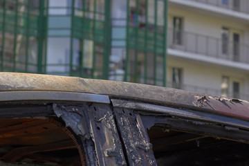 city burned cars after a fire in one of the city's districts