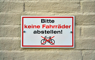Prohibition sign. Do not park bicycles sign in German. Means Letters with Bitte keine Fahrräder abstellen!