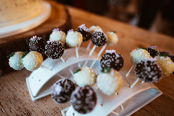 photo of wedding chocolate lollies on a table