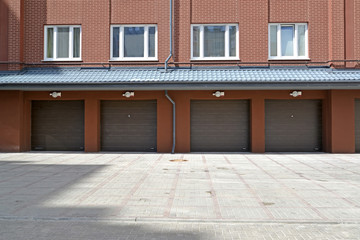 Garages on the ground floor of a modern apartment building. Zelenogradsk, Kaliningrad region