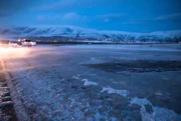 ice road with mountain at night