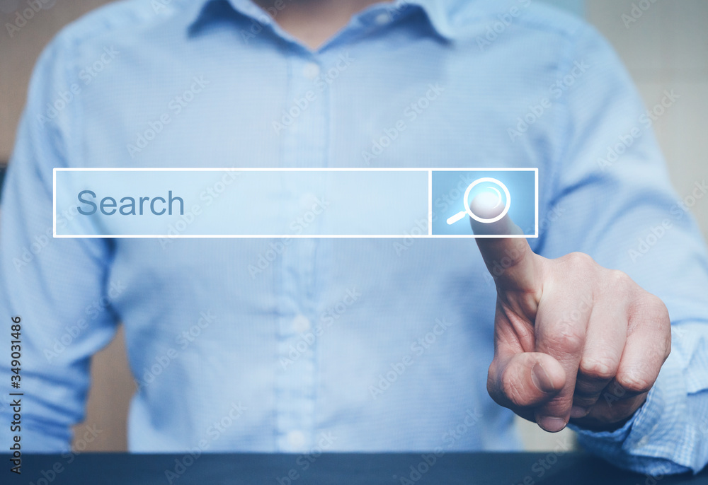 Fototapete Businessman clicking internet search page on computer touch screen. Concept Searching new job. Copy space.
