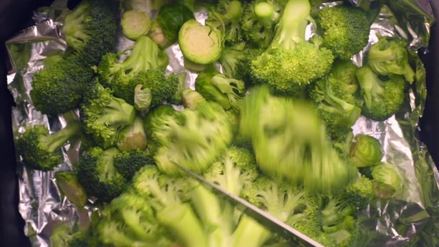 90 degree person preparing oven tray with organic vegetables - 8 sec