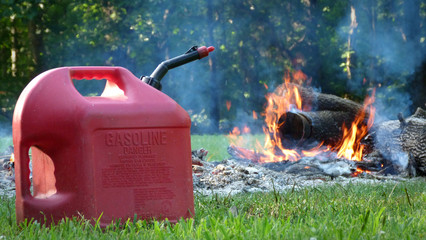 Gasoline Can in front of a Fire, Fire Hazard, Burning Hazard,