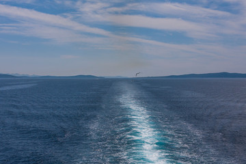 View of the sea behind sailing ships at sea