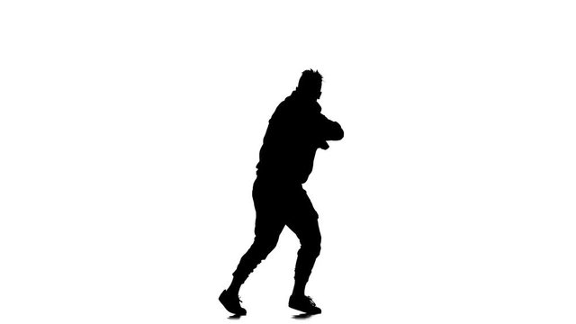 black silhouette on a white background, young energetic man dancing hip hop, freestyle, street dance, slow motion