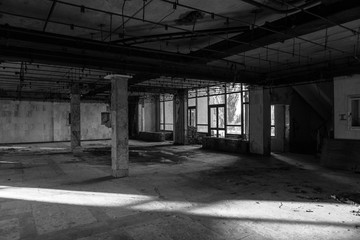 Ruins of abandoned buildings in 1986. Soviet architecture in Chernobyl. Danger of infection of...