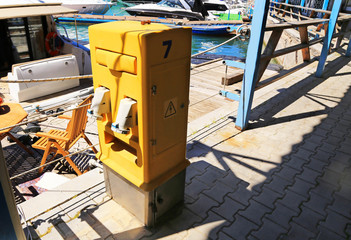 Service column on the pier. Specialized equipment for organizing the supply of technical and drinking water, electricity and other communications to ships. Service speakers are installed on berths and