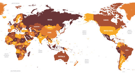World map - Asia, Australia and Pacific Ocean centered. Brown orange hue colored on dark background. High detailed political map of World with country, ocean and sea names labeling